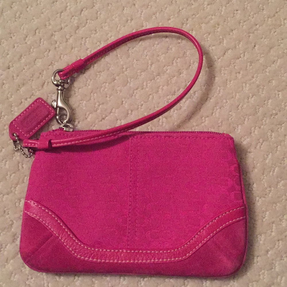 Dark pink Coach wristlet
